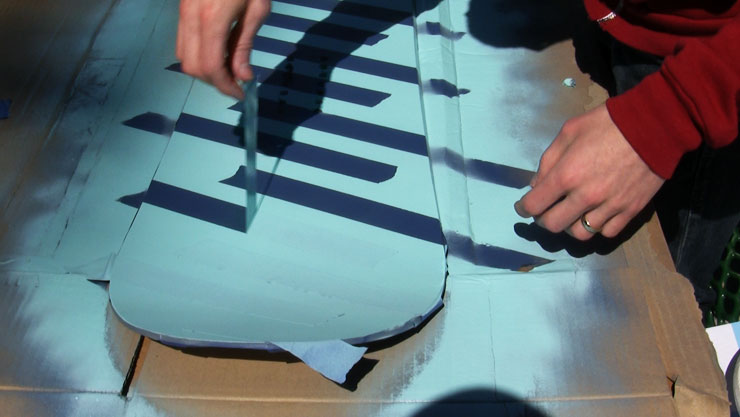 Remove tape from Blank Snowboard
